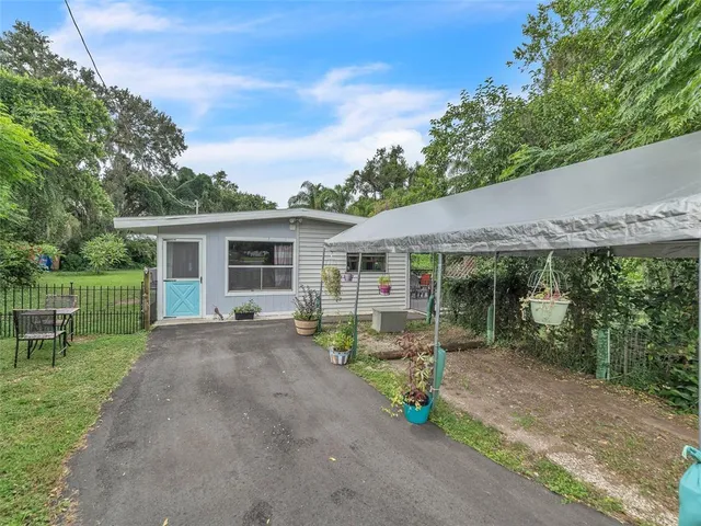 front view of a house with a patio