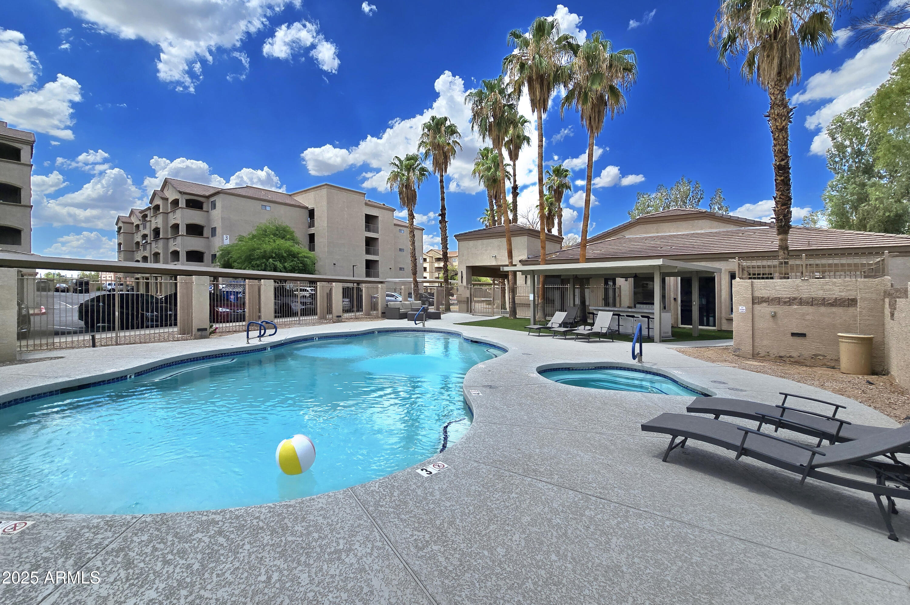 920 East Devonshire Avenue, Unit 2009 Phoenix, AZ 85014 - Photo 18 of 22 a view of a house with swimming pool and sitting area