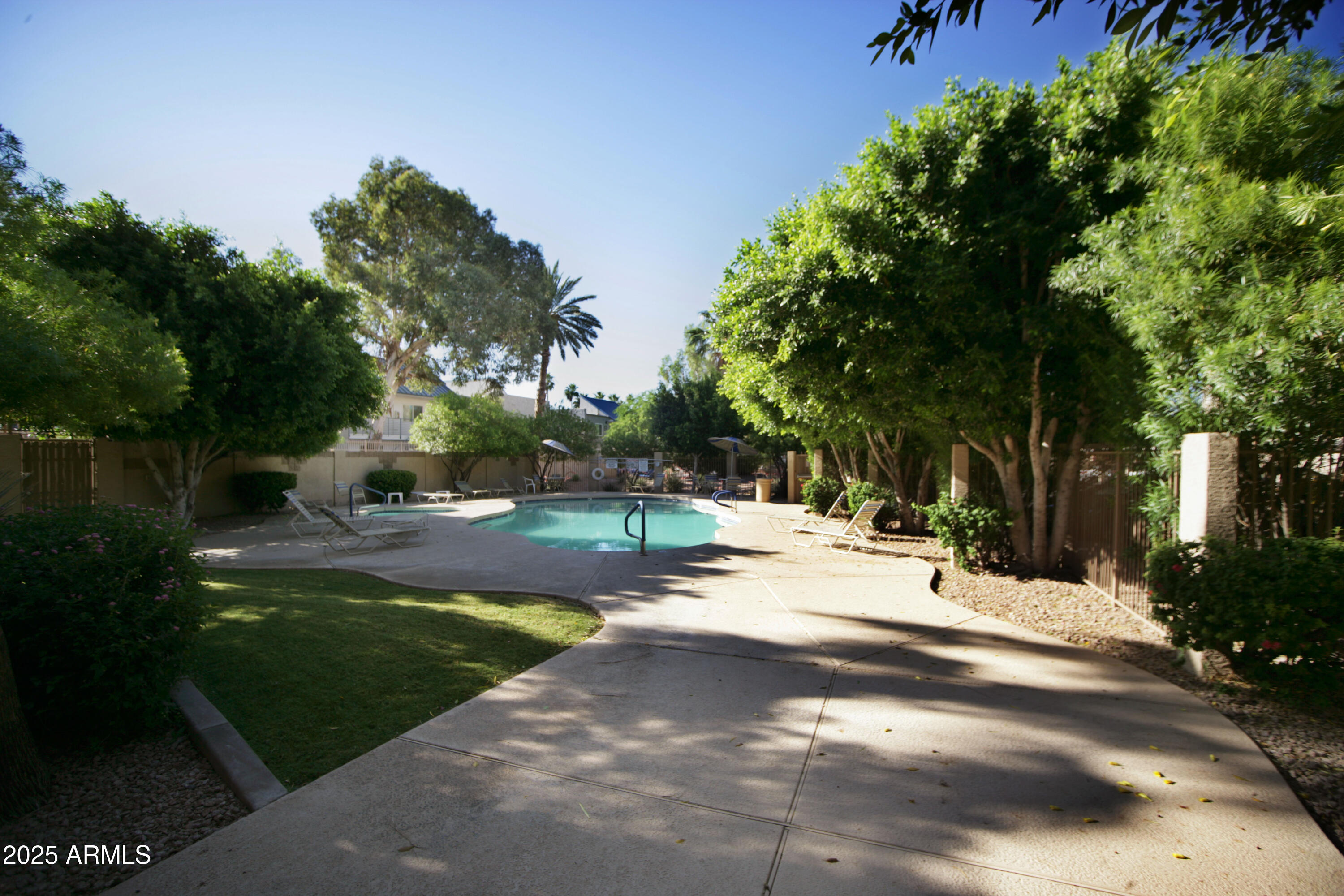 920 East Devonshire Avenue, Unit 2009 Phoenix, AZ 85014 - Photo 20 of 22 a view of a street with a yard