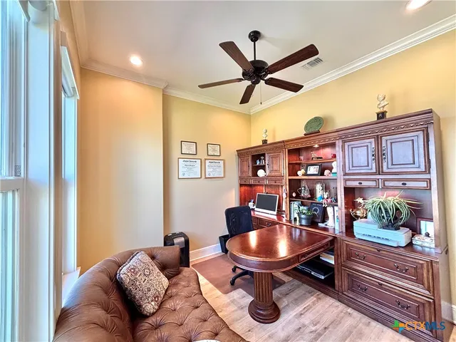 a room with furniture and a chandelier