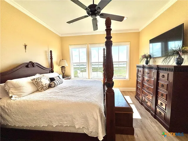 a view of a balcony with wooden floor