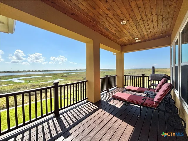 a bathroom with a tub a sink and a shower