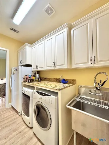 a view of a living room and dining room