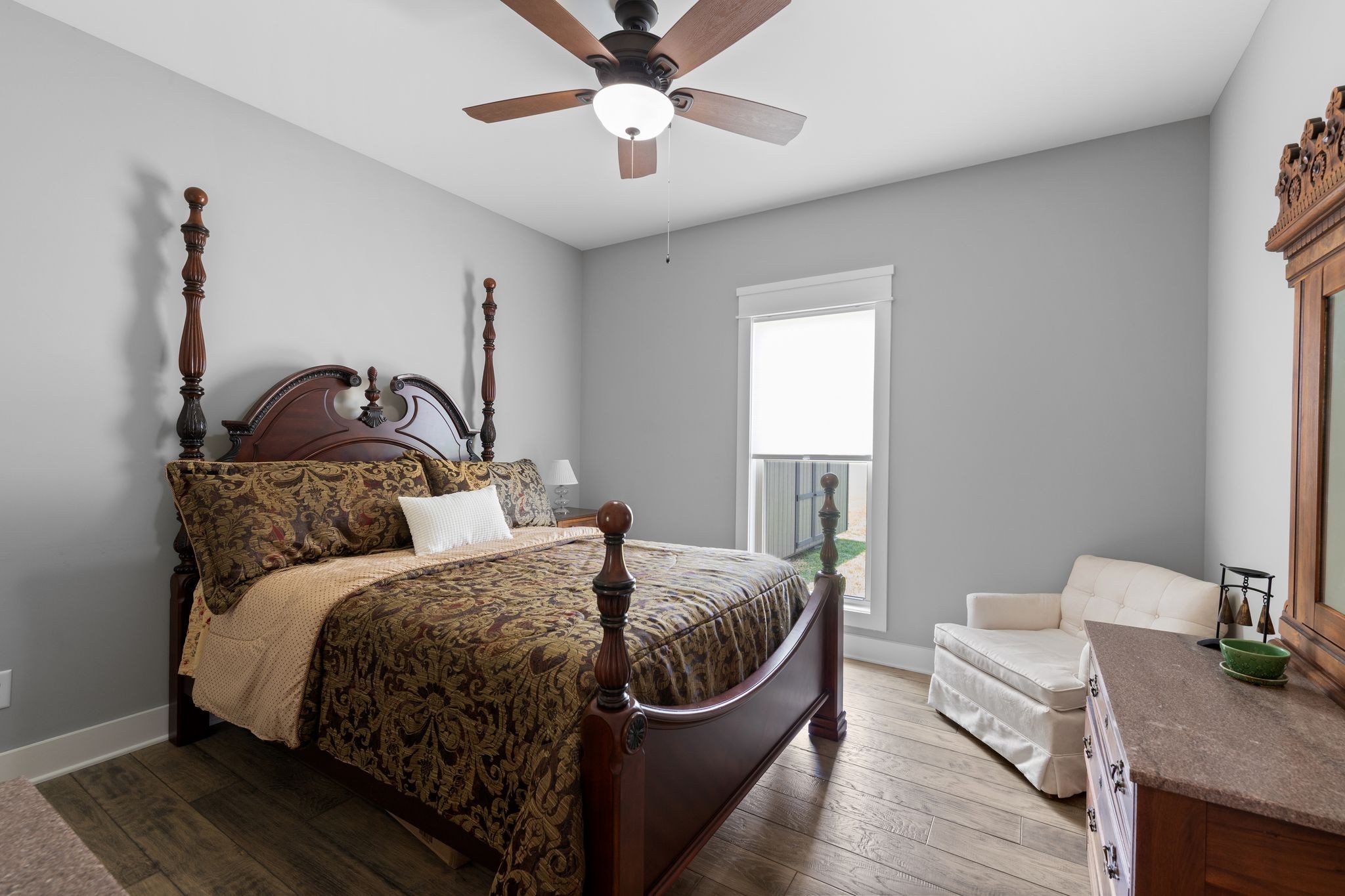 467 Halltown Road Portland, TN 37148 - Photo 23 of 33 a bedroom with a bed and a chandelier