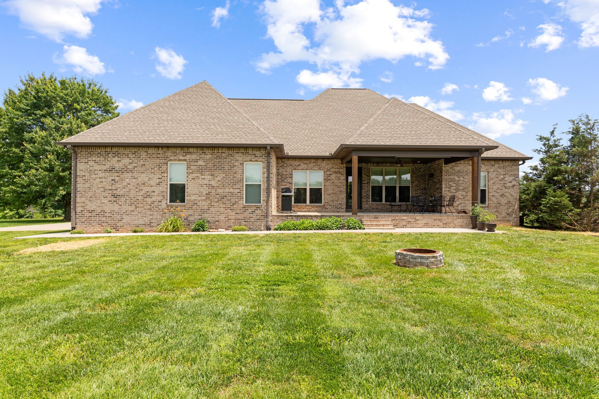 467 Halltown Road Portland, TN 37148 - Photo 4 of 33 a view of a house with a backyard