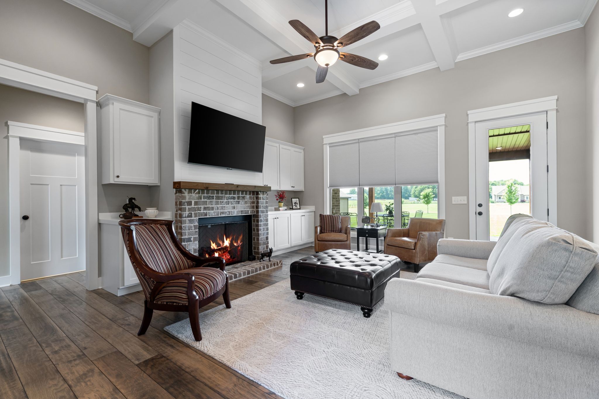 467 Halltown Road Portland, TN 37148 - Photo 8 of 33 a living room with furniture a flat screen tv and a fireplace
