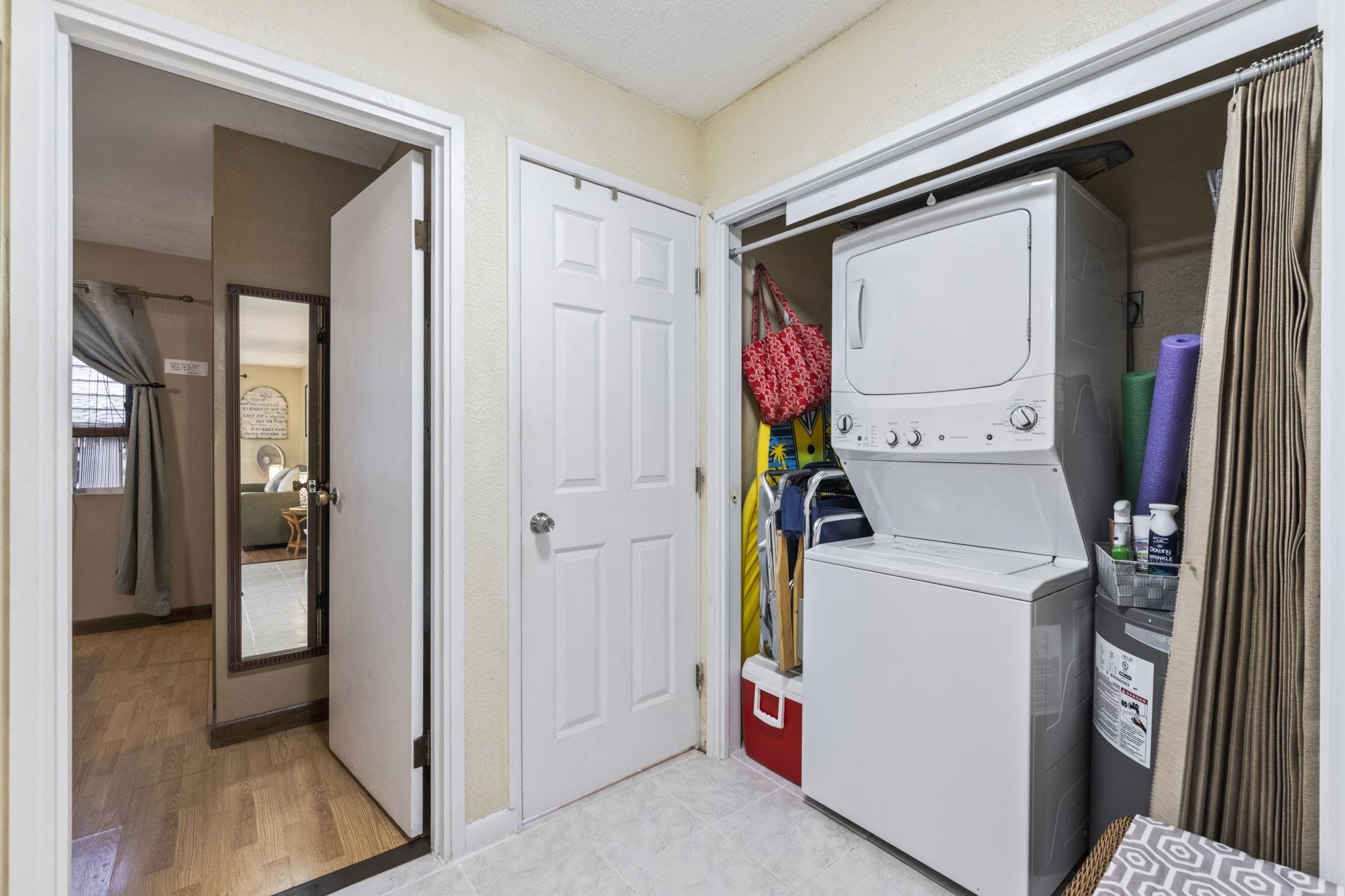 777 South Kihei Road, Unit 105 Kihei, HI 96753 - Photo 16 of 27 a utility room with dryer and washer
