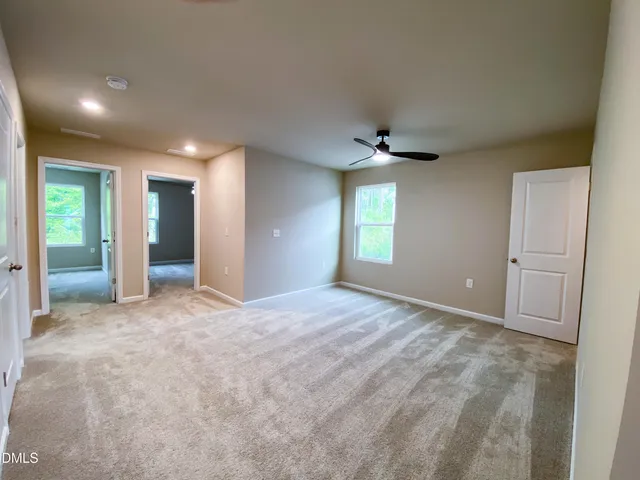 a bathroom that has a glass shower door