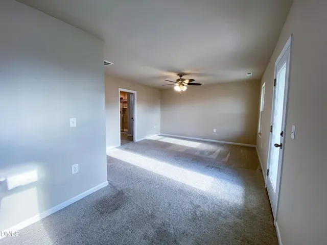 a bathroom with a double vanity sink and mirror