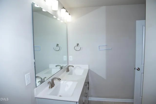 a view of a house with a small yard