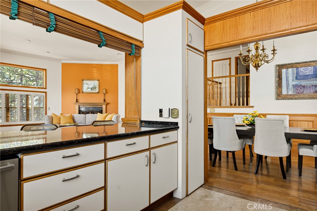971 Grass Valley Road Lake Arrowhead, CA 92352 - Photo 21 of 50 a kitchen with a sink and cabinets