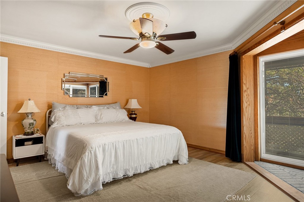 971 Grass Valley Road Lake Arrowhead, CA 92352 - Photo 35 of 50 a bedroom with a bed and window