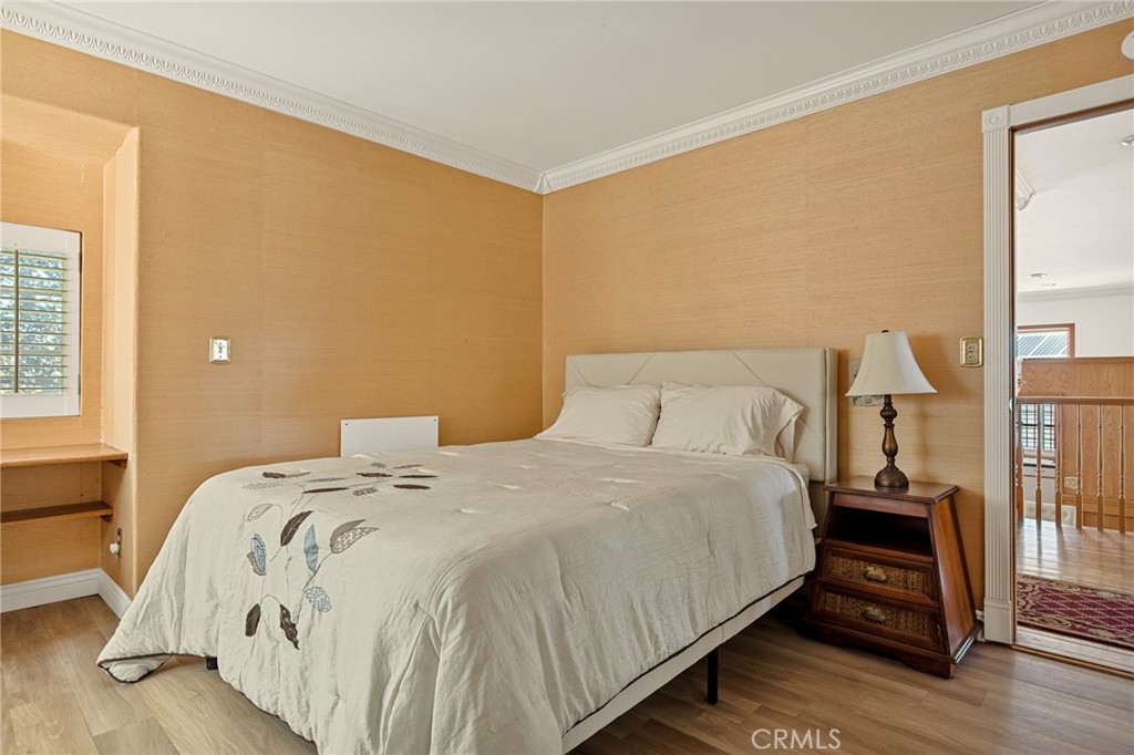 971 Grass Valley Road Lake Arrowhead, CA 92352 - Photo 40 of 50 a bedroom with a bed and a night stand