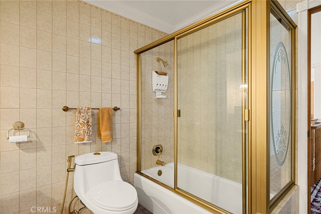 971 Grass Valley Road Lake Arrowhead, CA 92352 - Photo 43 of 50 a bathroom with a shower and a toilet