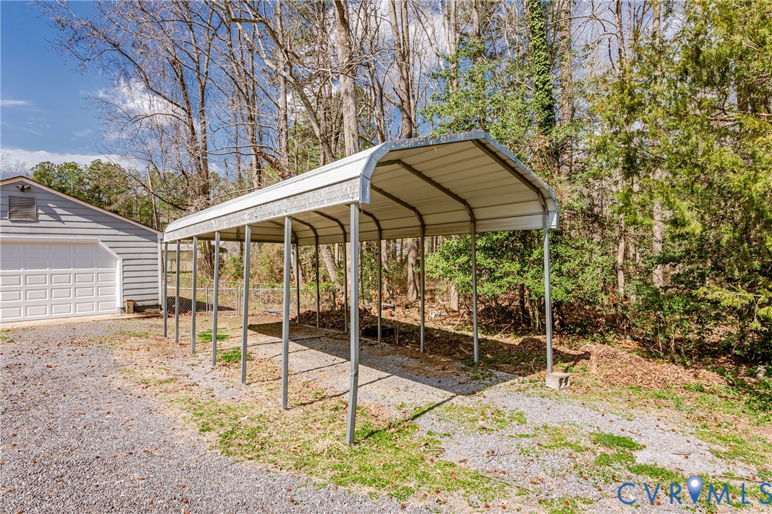 15412 Exter Mill Road Chesterfield, VA 23838 - Photo 11 of 66 View of parking with a detached garage and a carpo