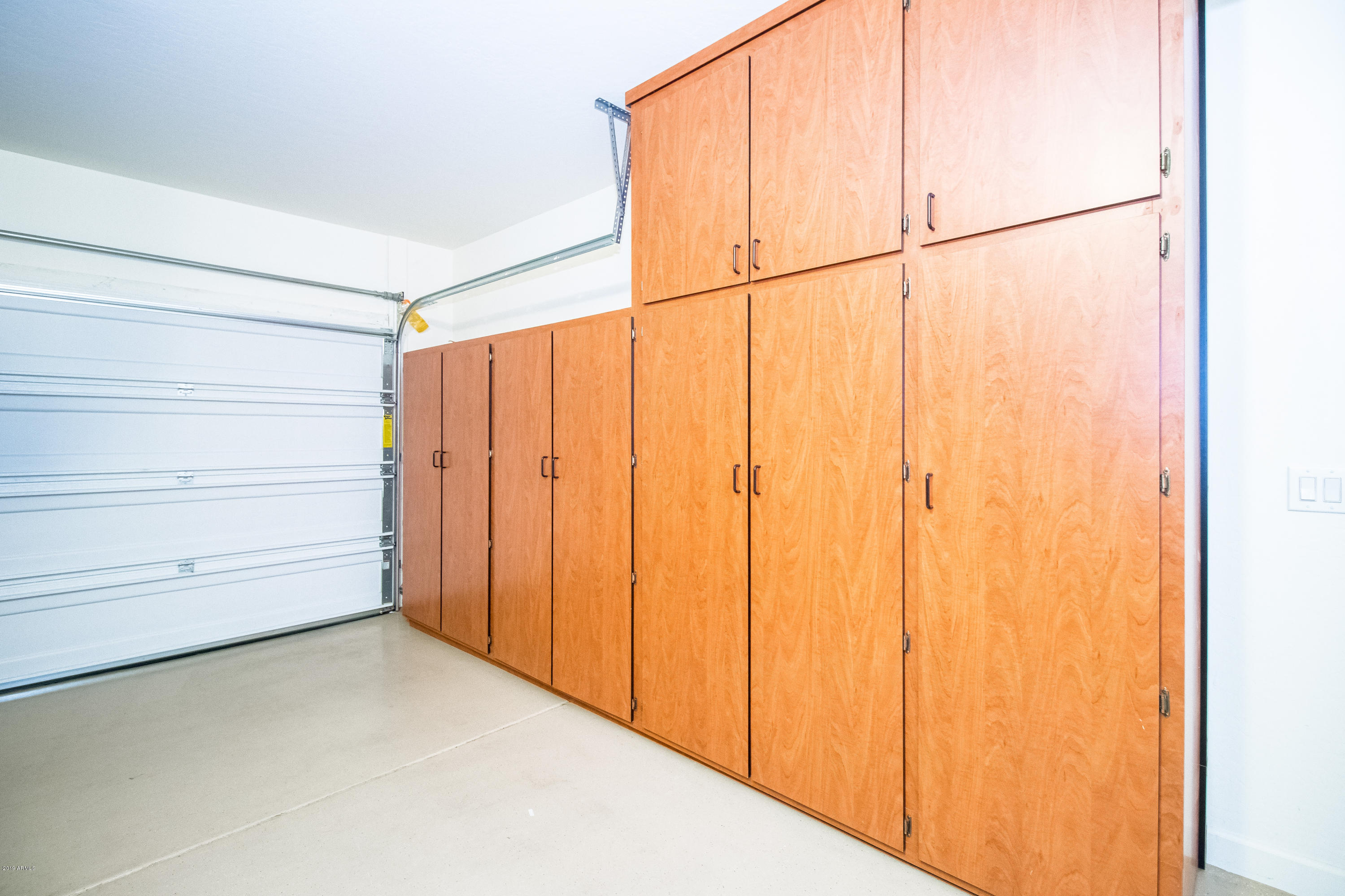 23635 West Ripple Road Buckeye, AZ 85326 - Photo 34 of 40 Garage Cabinets & Epoxy Floor
