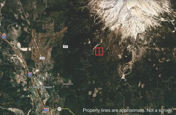 a view of a house with backyard porch and sitting area
