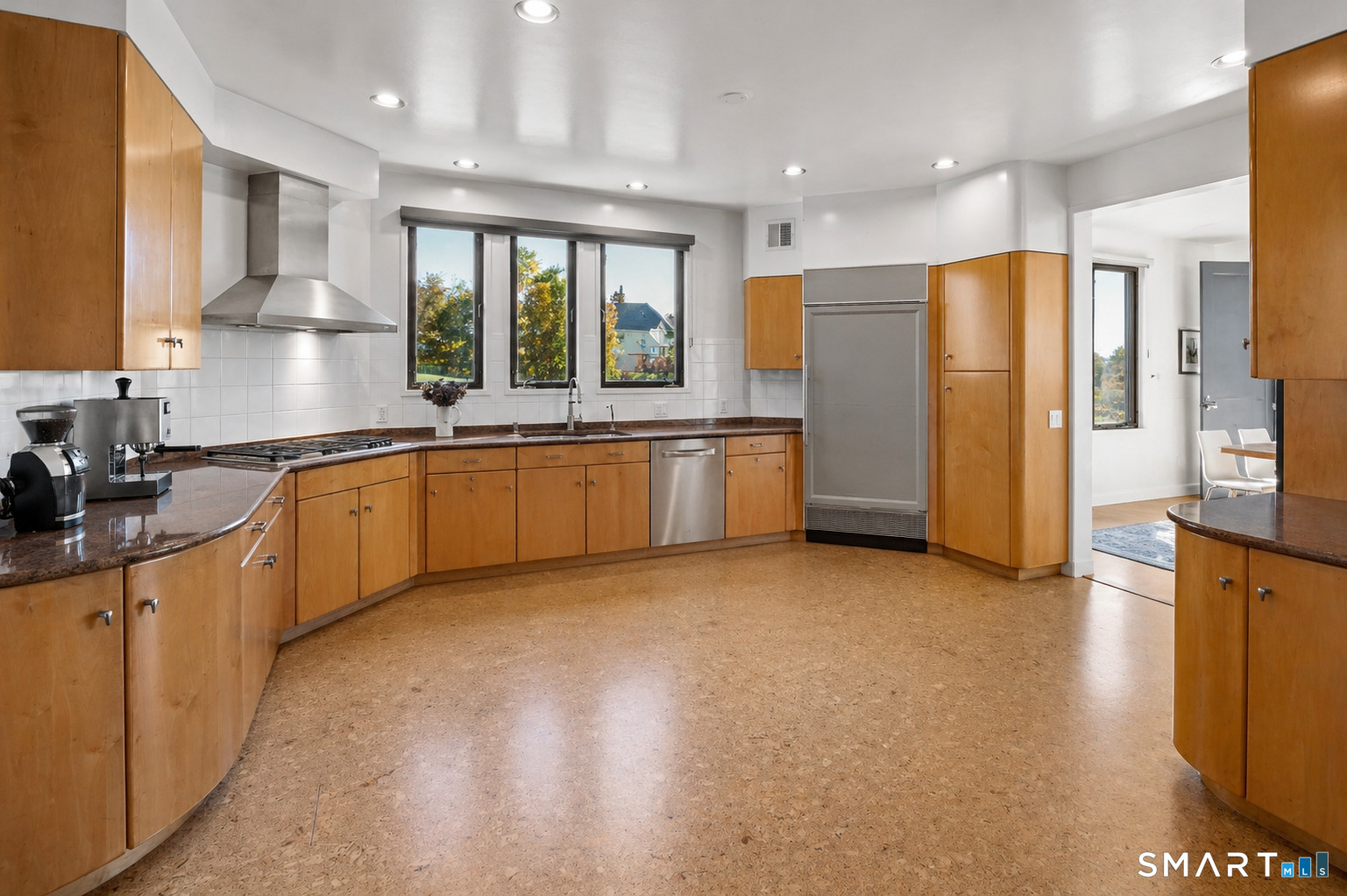 5 Longview Road Westport, CT 06880 - Photo 16 of 36 a open kitchen with stainless steel appliances granite countertop a refrigerator a sink a stove and oven