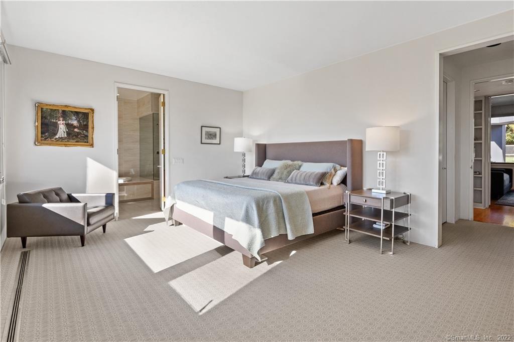 5 Longview Road Westport, CT 06880 - Photo 19 of 36 a bedroom with a bed and a couch