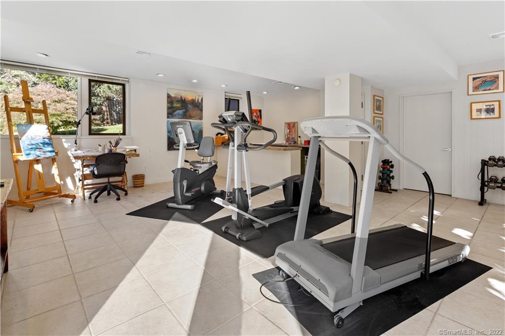 5 Longview Road Westport, CT 06880 - Photo 33 of 36 a room with gym equipment and windows