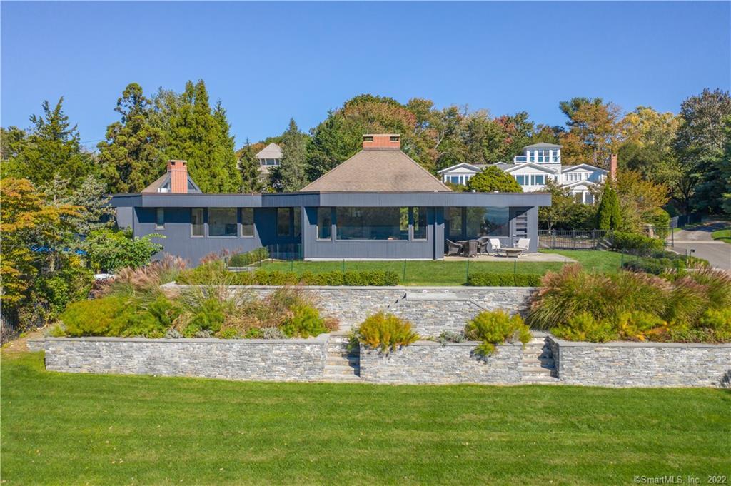 5 Longview Road Westport, CT 06880 - Photo 7 of 36 a front view of a house with a garden