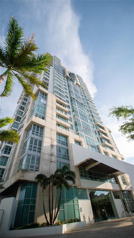a view of a balcony with sitting area