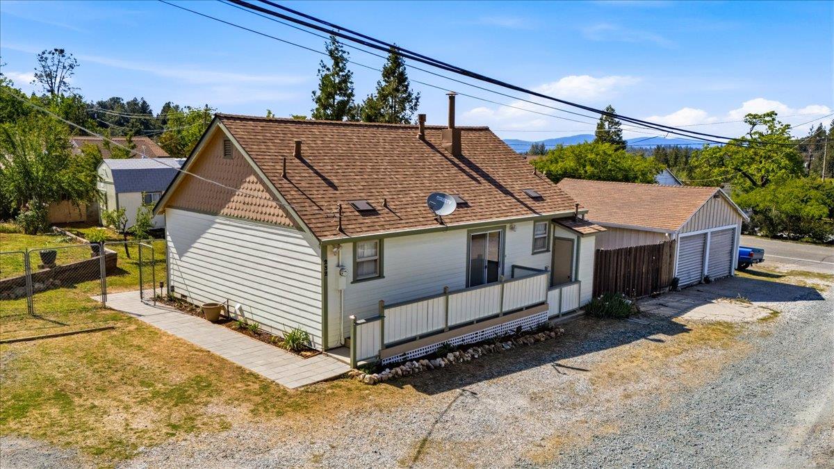 232 Upper Slate Creek Road Grass Valley, CA 95945 - Photo 43 of 48 a view of a house with a yard