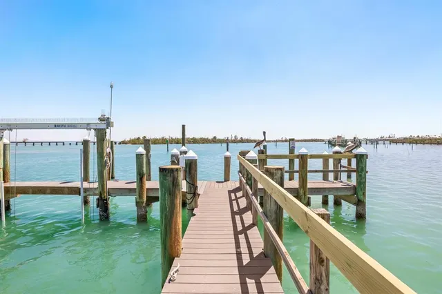 a view of a balcony with chairs