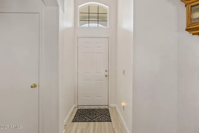a view of a bathroom from a hallway