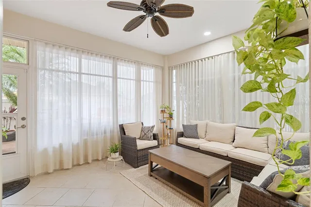 a living room with furniture and a window