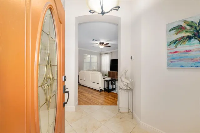 a view of a bedroom with a bed and toys