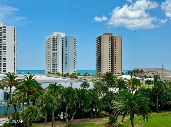 a view of a city with tall buildings