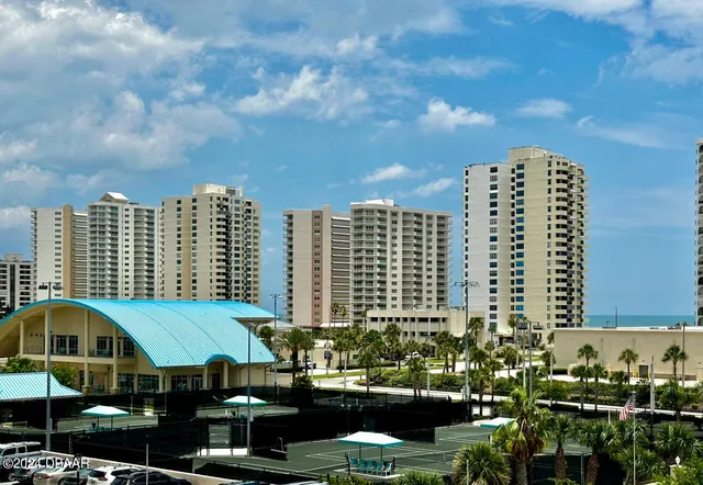 a view of a city with tall buildings