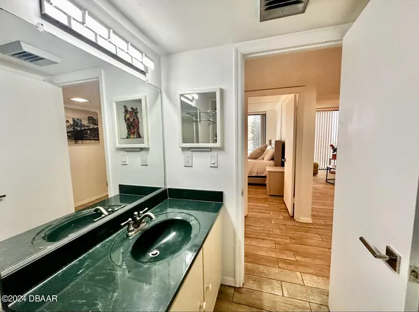 a hallway with a view of living room