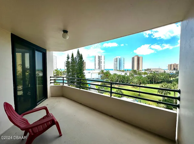a view of a two chair in the balcony