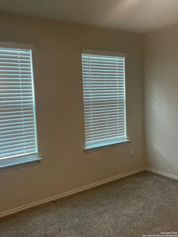 a bathroom with a sink and vanity