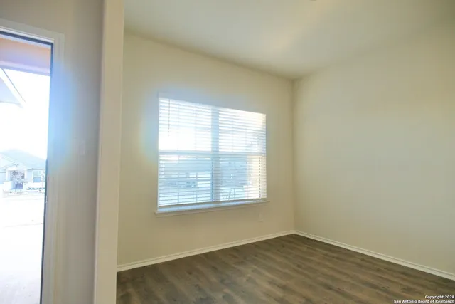 an empty room with windows