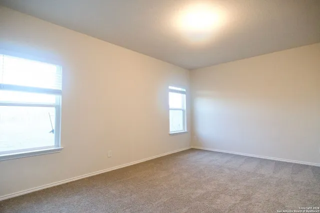 a bathroom with a toilet and a sink