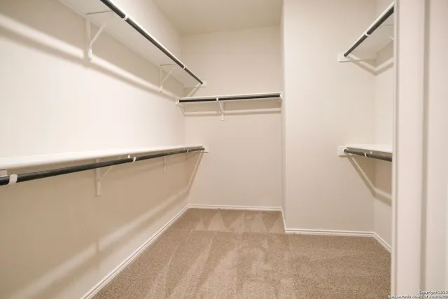 a view of a room that has a window