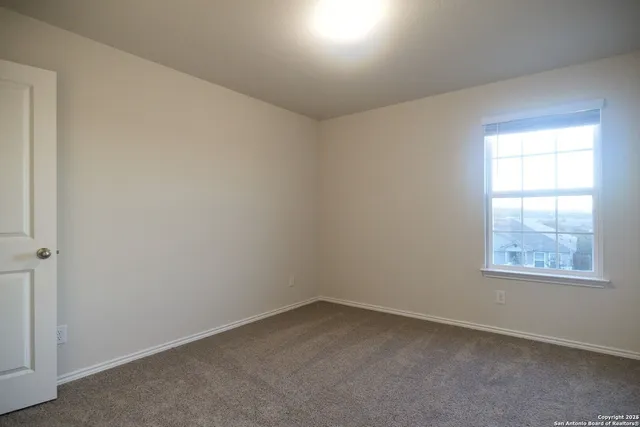 a picture of a bathroom with mirror