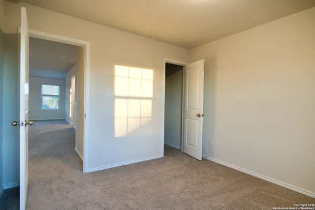 a view of balcony with wooden floor