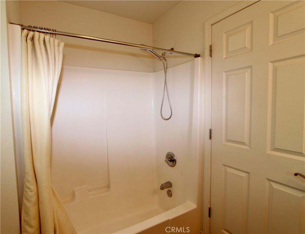 3085 Gardner Road Nice, CA 95464 - Photo 15 of 20 a bathroom with a shower and a glass door