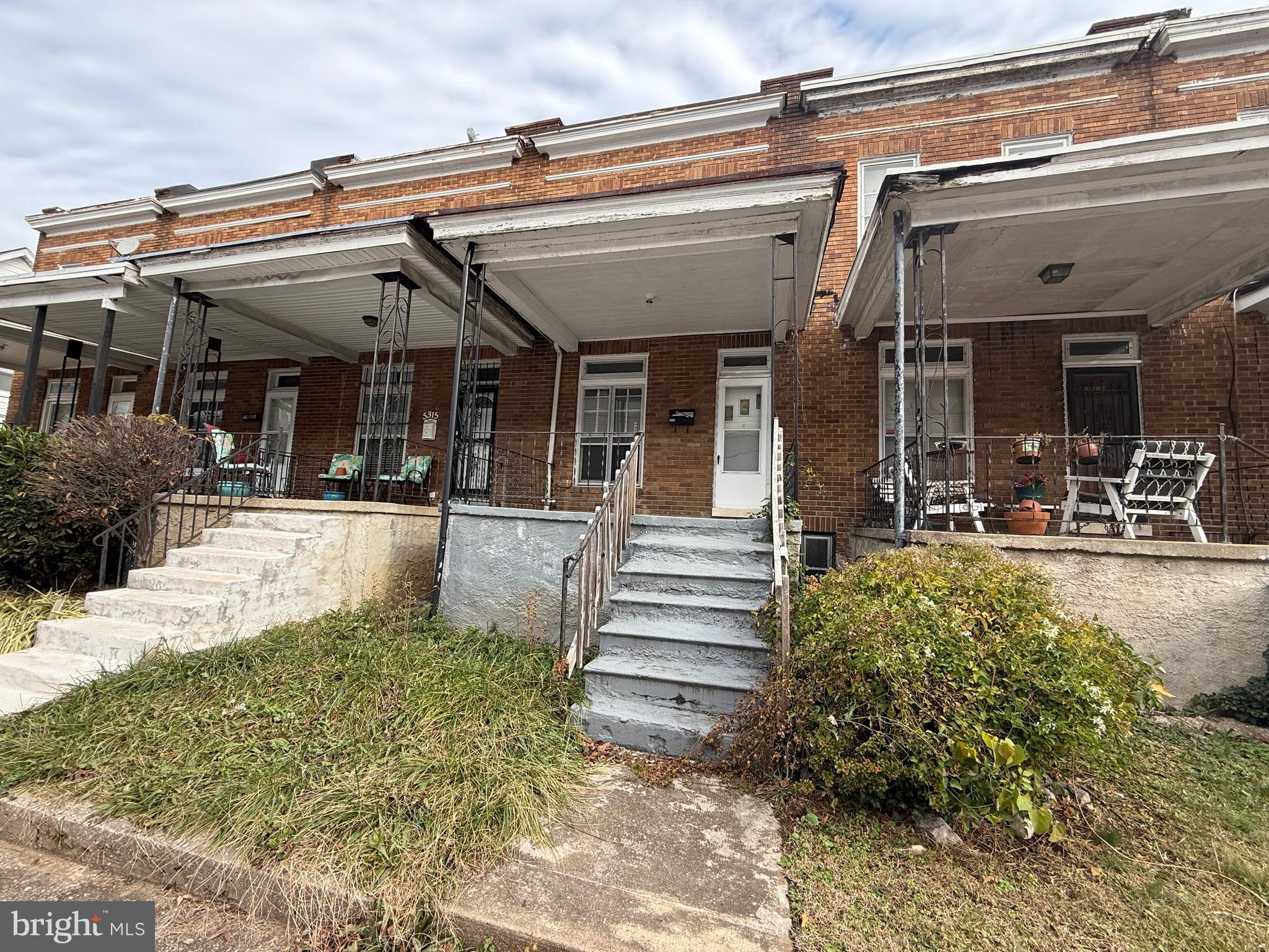 5313 Hamlin Avenue Baltimore, MD 21215 - Photo 1 of 14 a view of a building with patio