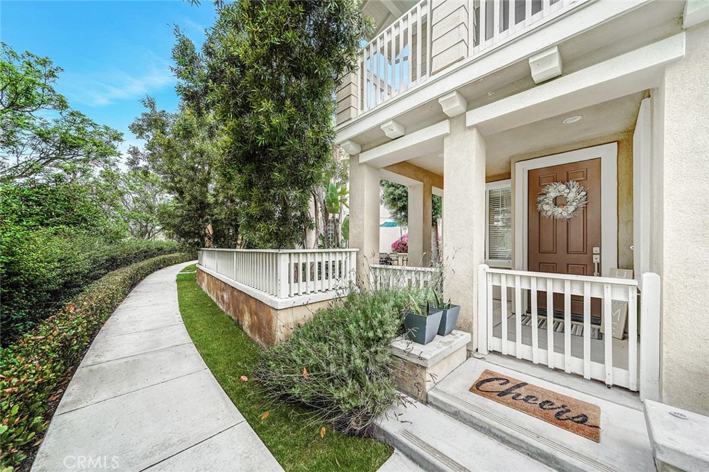 a view of a balcony with stairs and furniture