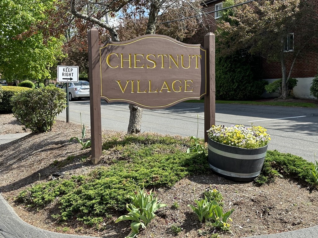25 Westgate Road, Unit 1 Chestnut Hill, MA 02467 - Photo 1 of 6 a sign on the side of the road