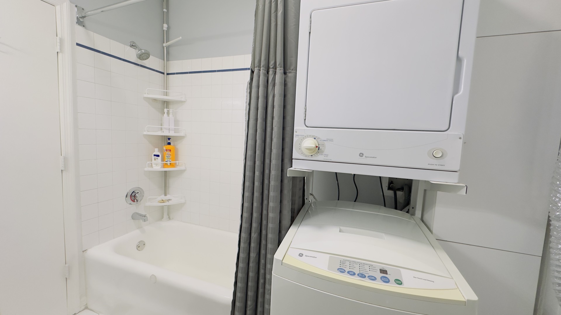 1411 West Farwell Avenue, Unit E2 Chicago, IL 60626 - Photo 24 of 27 a bathroom with a tub and shower