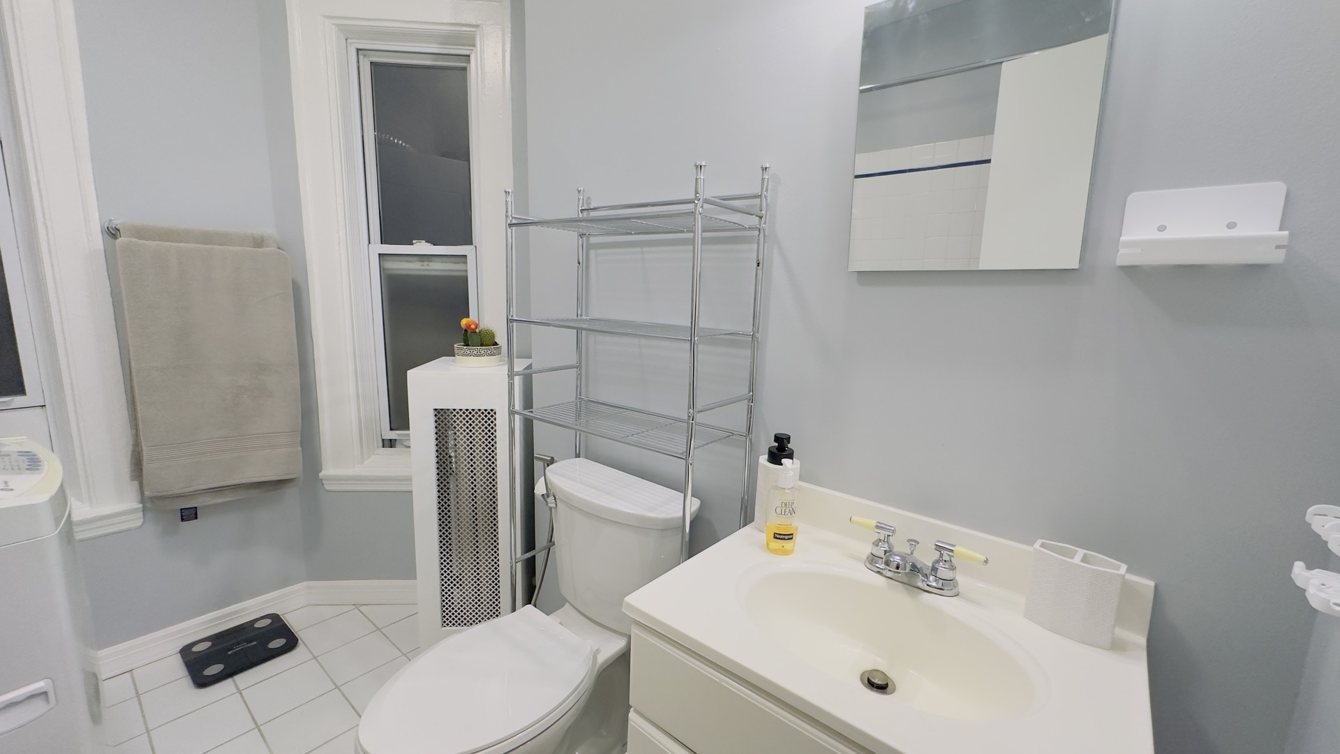 1411 West Farwell Avenue, Unit E2 Chicago, IL 60626 - Photo 27 of 27 a bathroom with a sink a toilet and shower