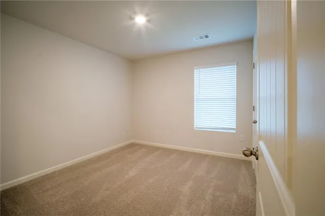 an empty room with a window