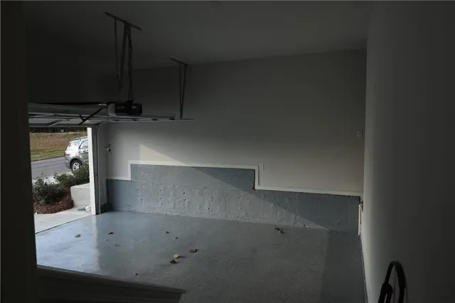 a view of balcony with wooden fence