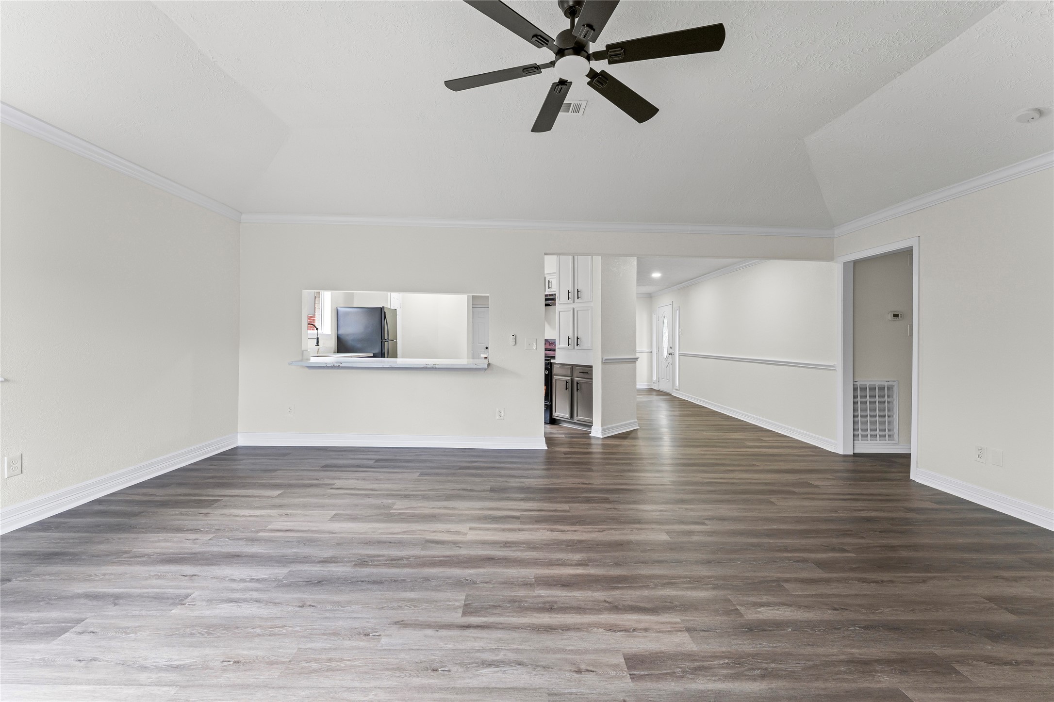 1506 Leadenhall Circle Channelview, TX 77530 - Photo 13 of 34 a view of empty room with wooden floor and window